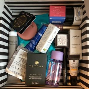 High end fun box of travel size skin care & makeup